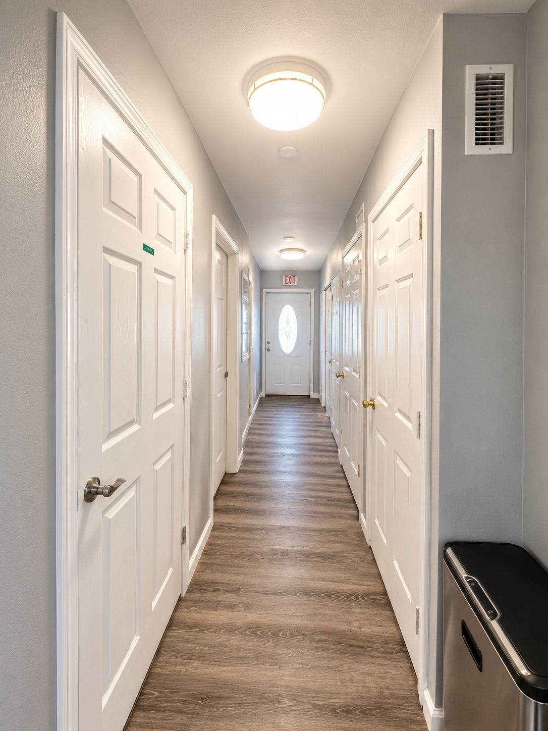 Clean accessible interior hallway with room access at Life Worth Living Adult Family Home